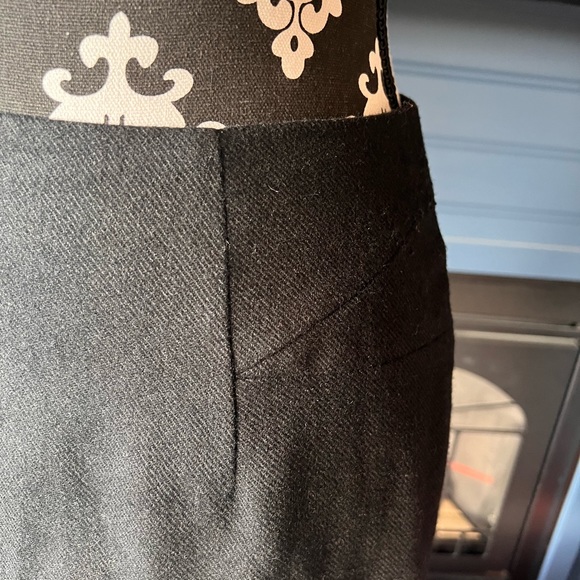 BLack wool like skirt. Lined. Fitted. I believe it says size 5! - Picture 3 of 5
